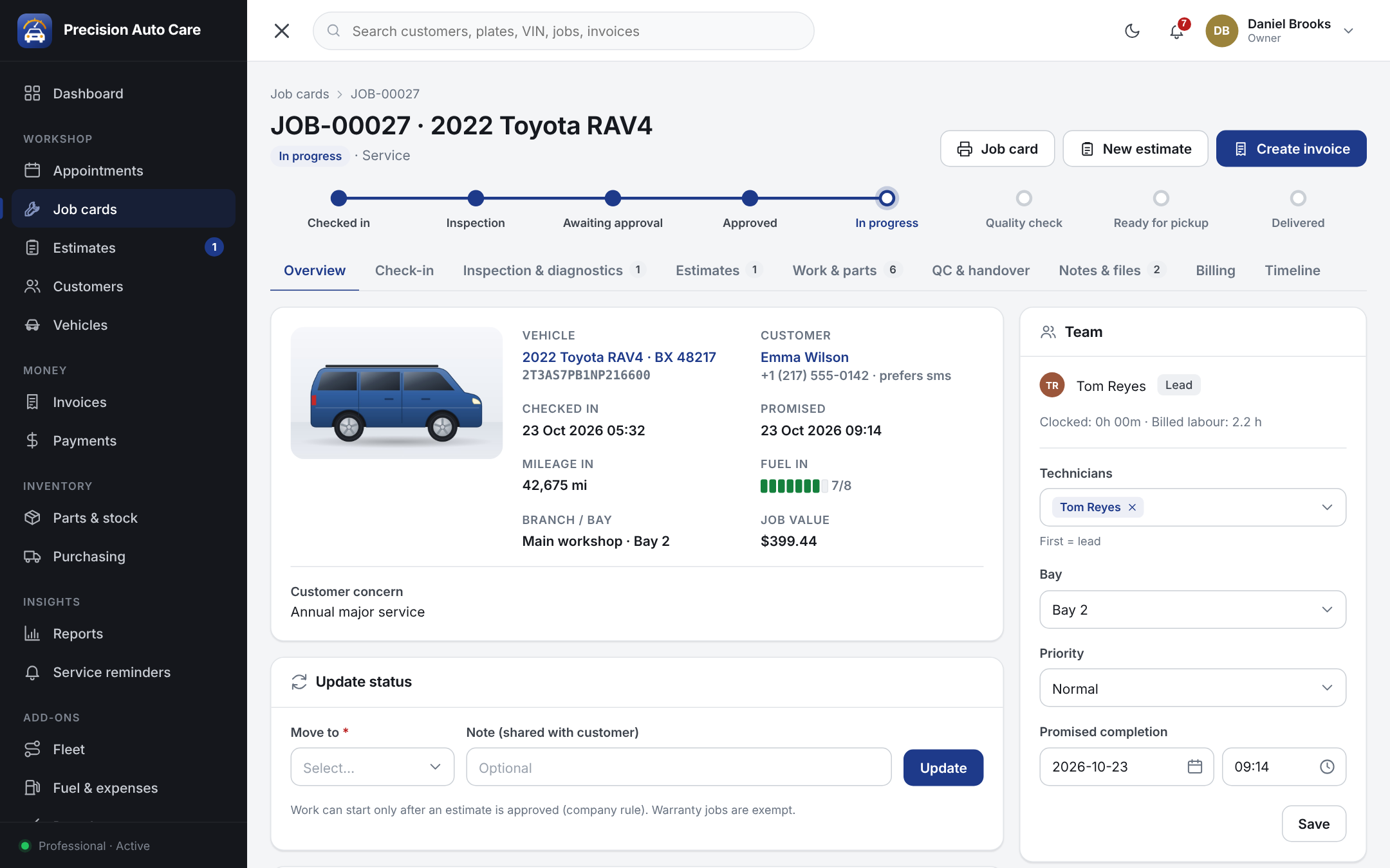 Digital job card in garage management software with vehicle details, mileage, fuel level, technician and job progress